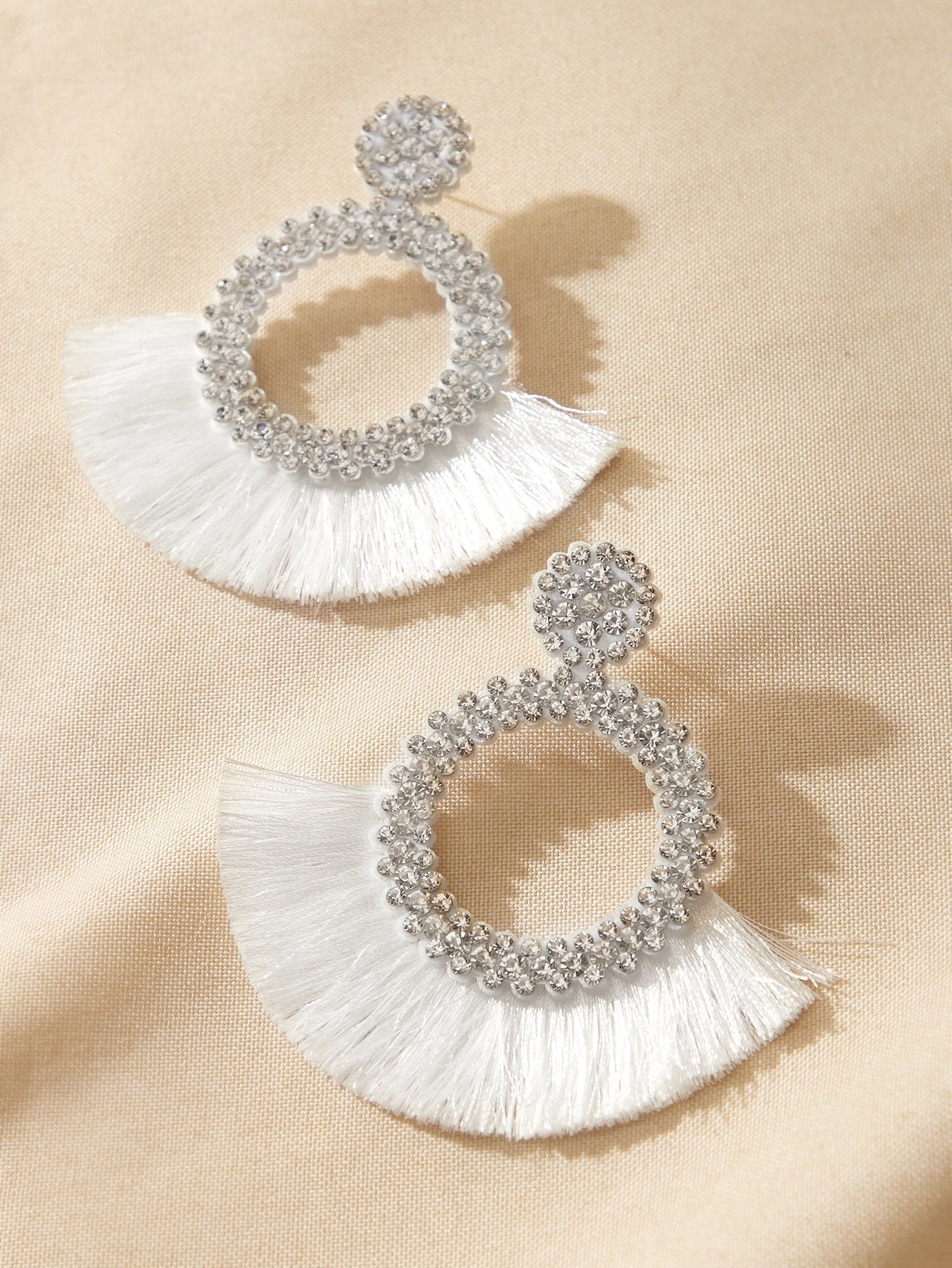 Drop earrings with artificial diamond engraving