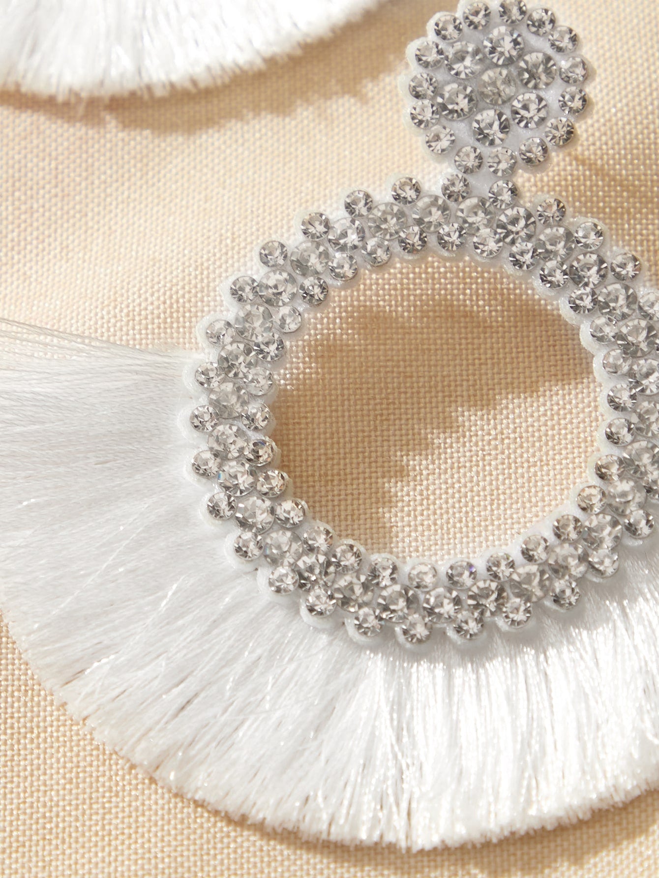 Drop earrings with artificial diamond engraving