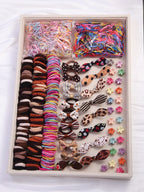 Set of 865 pieces hair accessories, hair clips and hair ties in caramel and assorted colors for girls, comes packaged in a bag