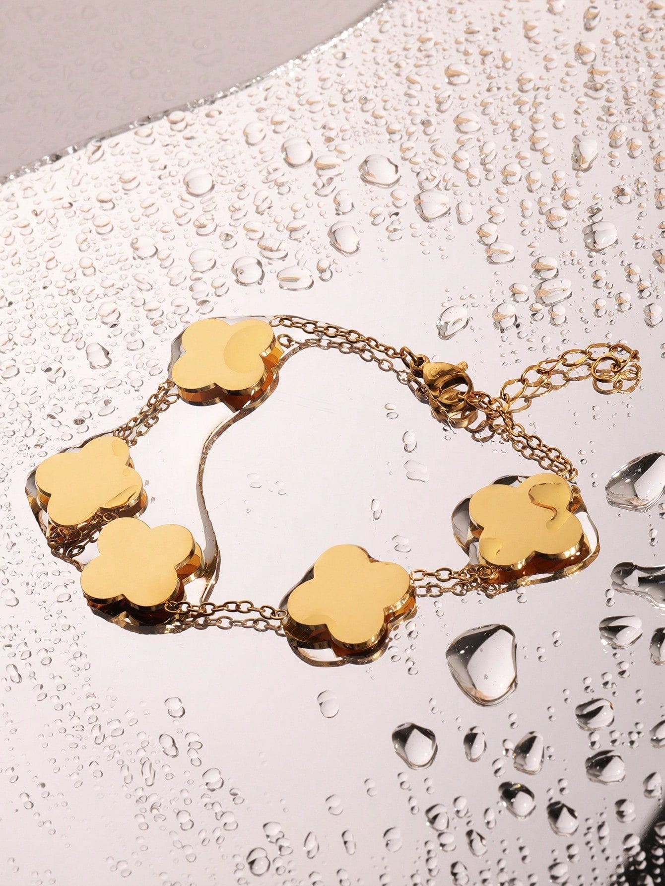 Personalized design stainless steel bracelet with a shiny, bright floral pattern. Simple structure, suitable for women's daily use.