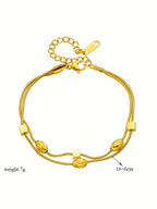 Double layer woven studded chain bracelet in gold plated stainless steel with screw-in fastening