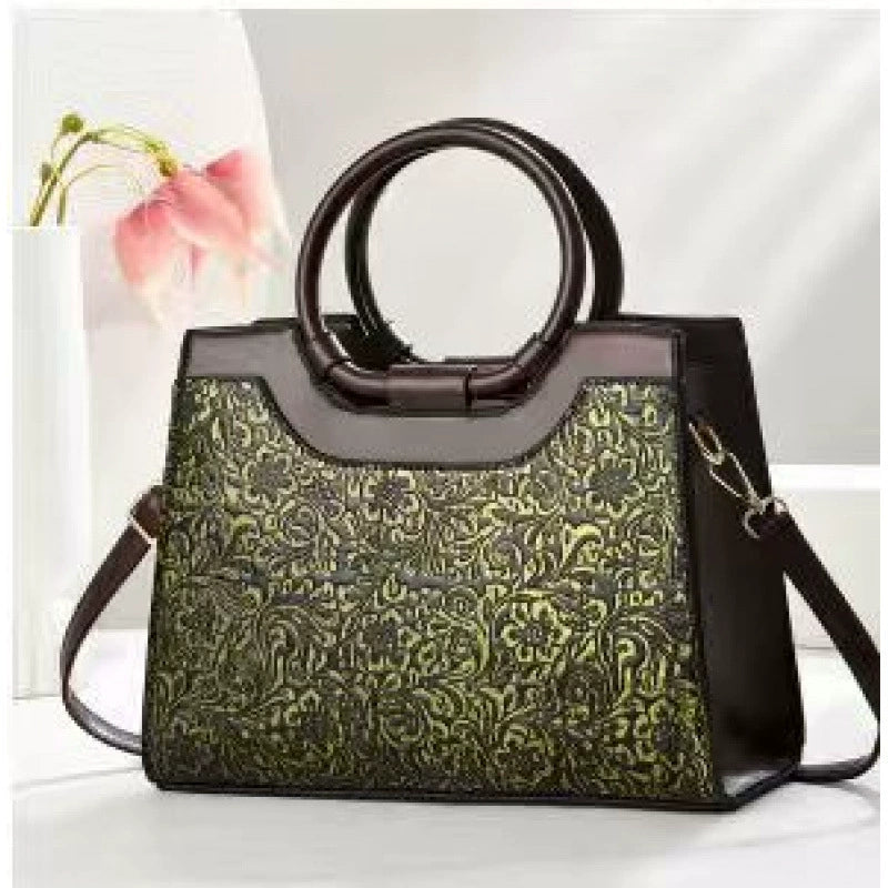 New cross-border women's handbags, large capacity, fashionable commuter bags, trendy embroidered middle-aged women's bags wholesale.