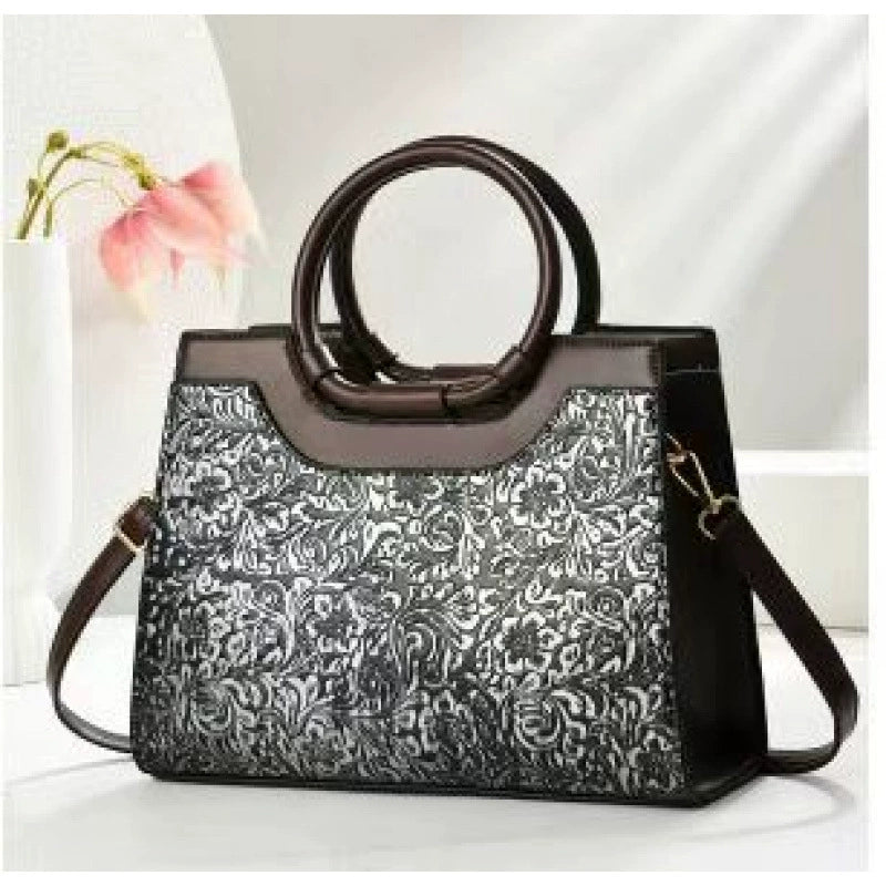 New cross-border women's handbags, large capacity, fashionable commuter bags, trendy embroidered middle-aged women's bags wholesale.