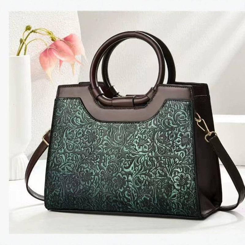 New cross-border women's handbags, large capacity, fashionable commuter bags, trendy embroidered middle-aged women's bags wholesale.