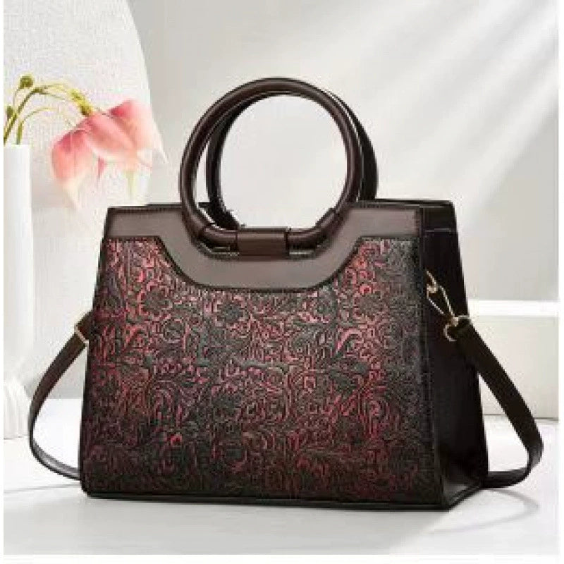 New cross-border women's handbags, large capacity, fashionable commuter bags, trendy embroidered middle-aged women's bags wholesale.