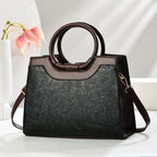 New cross-border women's handbags, large capacity, fashionable commuter bags, trendy embroidered middle-aged women's bags wholesale.